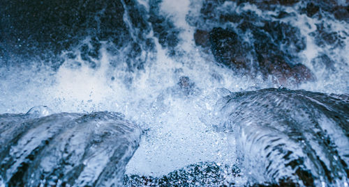 Close-up of water splashing in sea