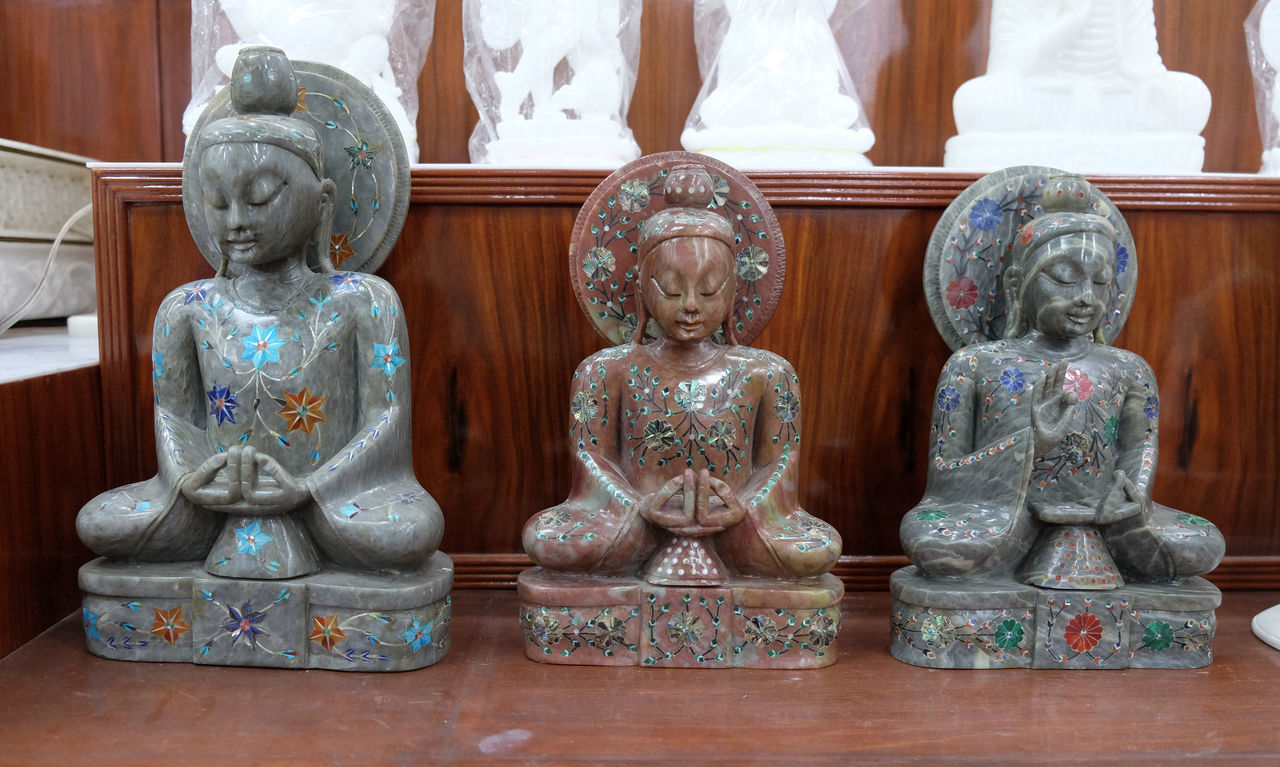 CLOSE-UP OF BUDDHA STATUE