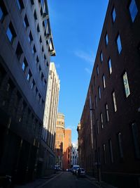 Low angle view of buildings against clear sky