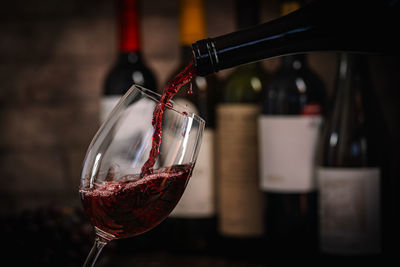 Close-up of wineglass on table