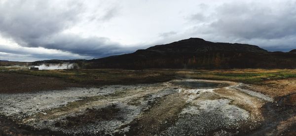 View of landscape against cloudy sky