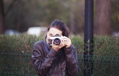 Portrait of man photographing