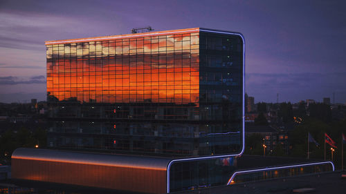 Buildings in city at night