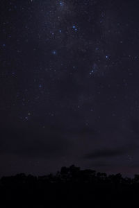 Scenic view of star field against sky at night