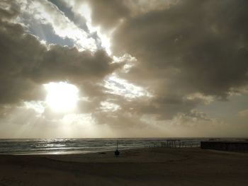 Scenic view of sea against dramatic sky