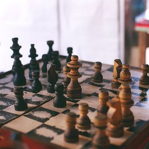 Close-up of chess pieces on board