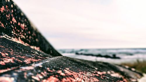 Surface level of sea shore against sky