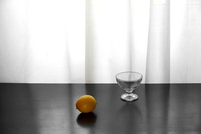 Fruits in glass on table