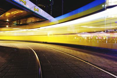 Blurred motion of illuminated train at night