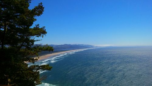 High angle view of calm sea against clear sky