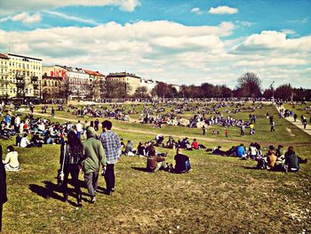 Group of people on grassy field