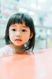 Close-up of cute girl in supermarket