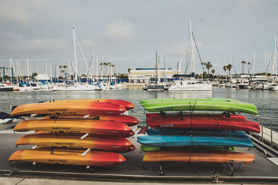 Boats moored at harbor