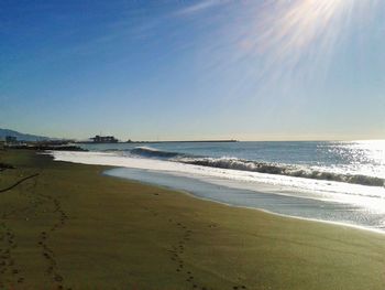 Scenic view of beach against sky