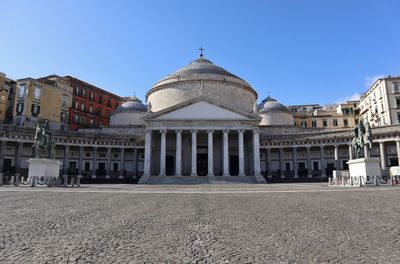 View of historical building against clear blue sky