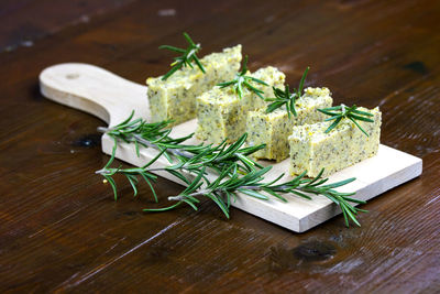 Close-up of polenta with cheese and rosemary