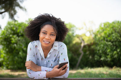 Portrait of smiling young woman