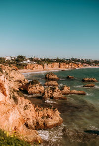 Scenic view of sea against clear blue sky
