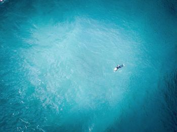 High angle view of person swimming in sea