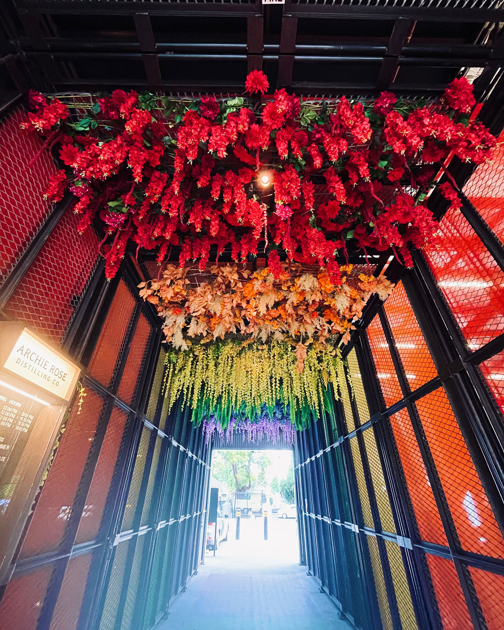 architecture, built structure, red, lighting equipment, ceiling, low angle view, no people, indoors, hanging, building, decoration, flower, nature, plant, interior design, day