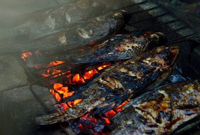 Close-up of meat on barbecue grill