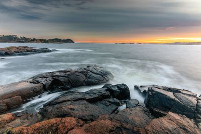 Waves creeping up to the rocks