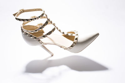 Close-up of chain against white background