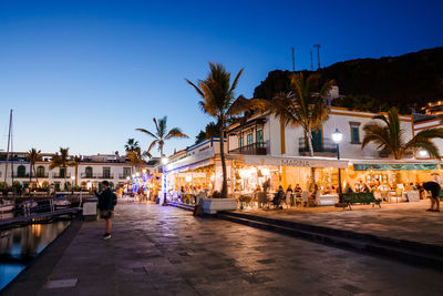 Traditional colorful buildings in a puerto de mogan fishing village.