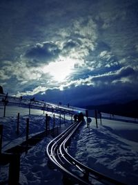 Bridge over sea against sky
