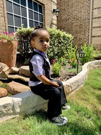 Boy looking at plants