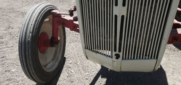 Close-up of vintage car on street