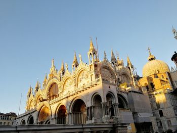 Low angle view of temple building against clear sky