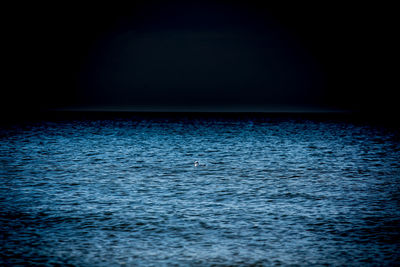 Scenic view of sea at night