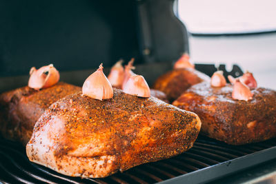 Close-up of meat on barbecue grill