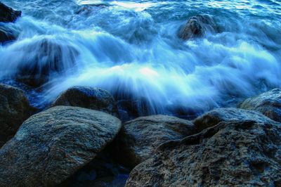 Waves splashing on rocks