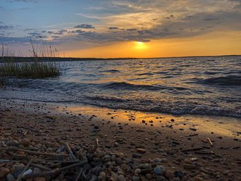 Scenic view of sea against sky during sunset