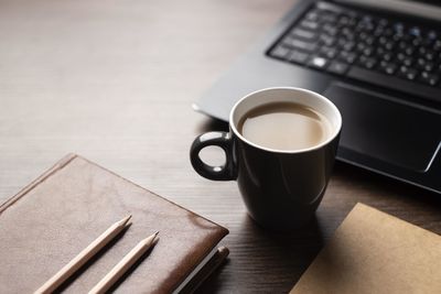 High angle view of coffee on table