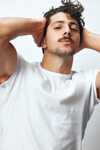 Portrait of young man looking away