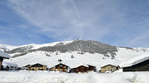 Scenic view of snow covered mountains