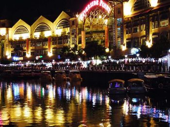 Reflection of illuminated buildings in water