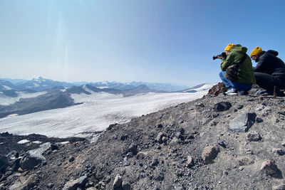 Panoramic view of snowcapped mountains against sky