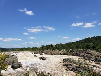 Scenic view of rocks against sky