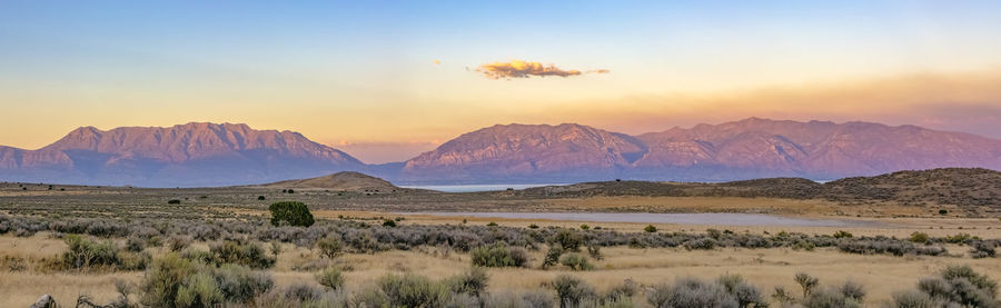 Scenic view of landscape against sky during sunset