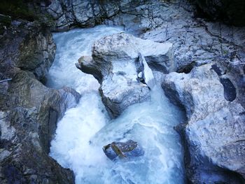 View of waterfall in river