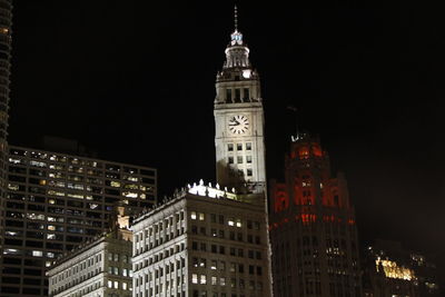 Low angle view of tower at night