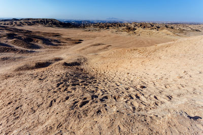 Scenic view of desert against sky