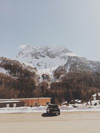 Scenic view of snow covered mountains