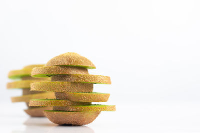 Close-up of stack against white background