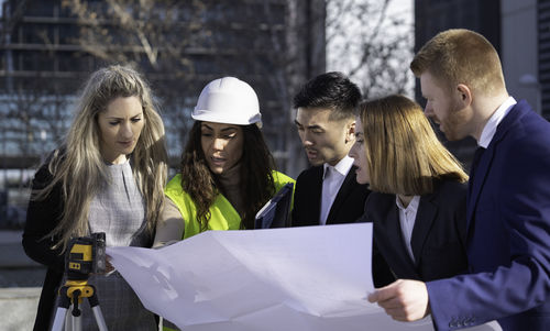 Business colleagues working in office
