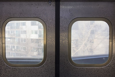 Buildings seen through train window